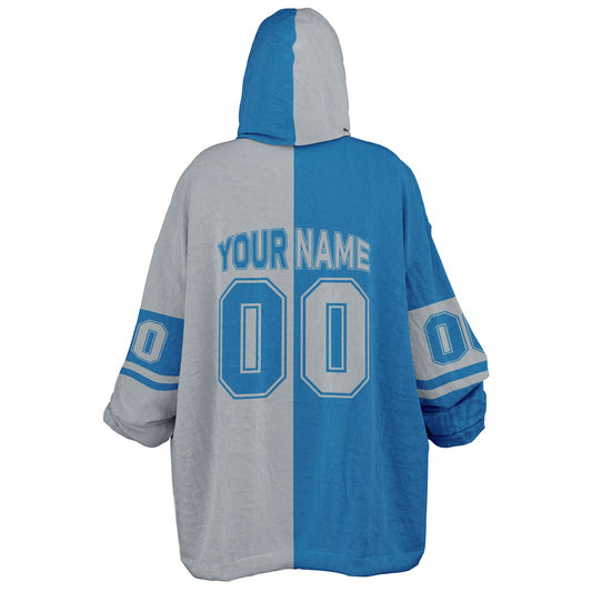 Blue and silver halftime snug hoodie featuring a symmetrical split design for a dynamic game-day look