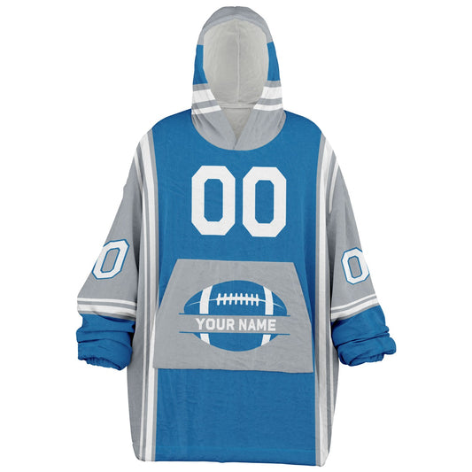 Blue, silver, and white bold snug hoodie with triple color blocking and a sporty aesthetic.