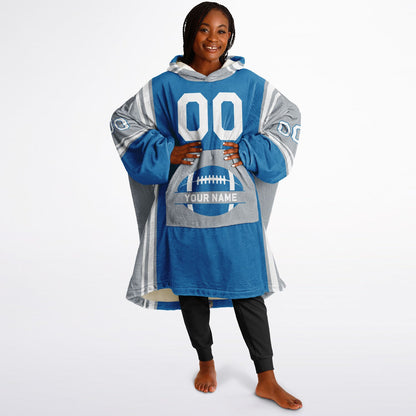Blue, silver, and white bold snug hoodie with triple color blocking and a sporty aesthetic.
