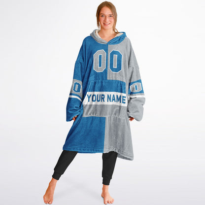Blue, silver, and white halftime snug hoodie with three-tone split design and cozy fleece texture.