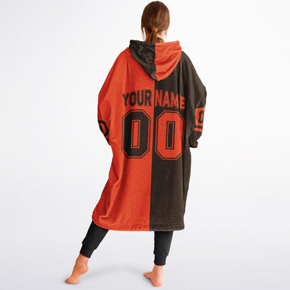 Brown and orange halftime snug hoodie featuring a symmetrical split design for a dynamic game-day look.