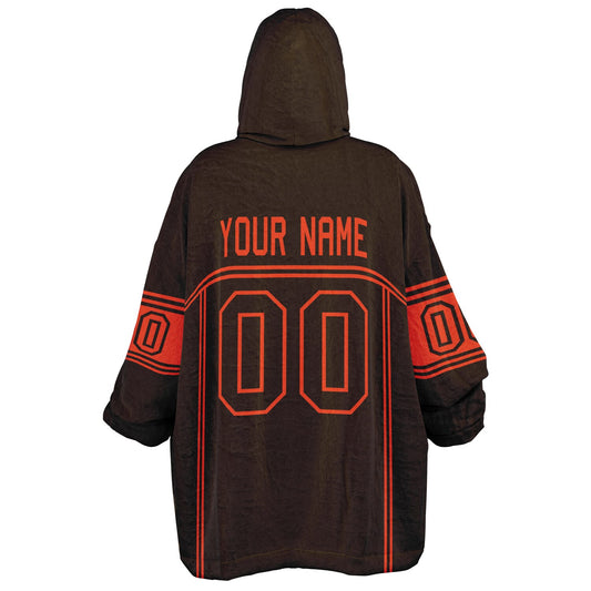 Brown and orange lineup snug hoodie featuring sleek line-art details and minimalist team-inspired design.