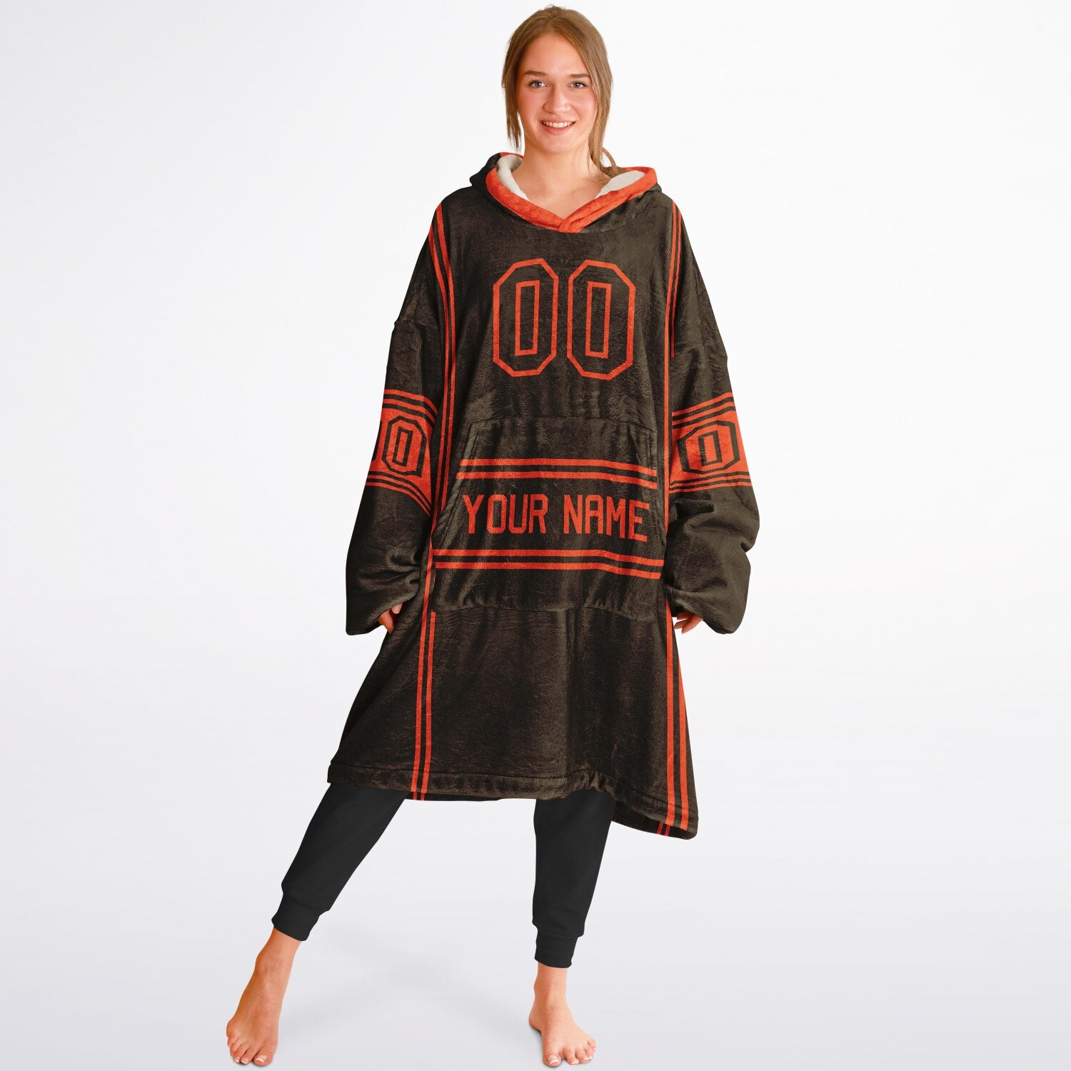 Brown and orange lineup snug hoodie featuring sleek line-art details and minimalist team-inspired design.