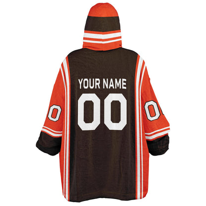 Brown, orange, and white bold snug hoodie with triple color blocking and a sporty aesthetic.