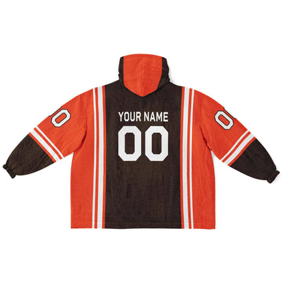 Brown, orange, and white bold snug hoodie with triple color blocking and a sporty aesthetic.