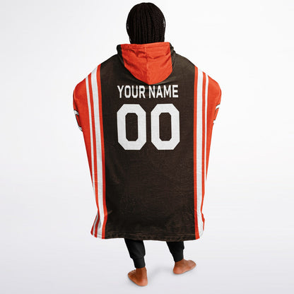 Brown, orange, and white bold snug hoodie with triple color blocking and a sporty aesthetic.