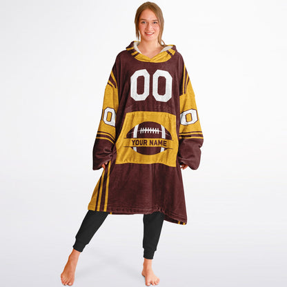 Burgundy and gold bold snug hoodie with modern color-block design and soft loungewear fit.