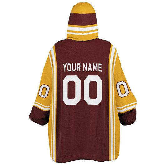 Burgundy, gold, and white bold snug hoodie with triple color blocking and a sporty aesthetic.