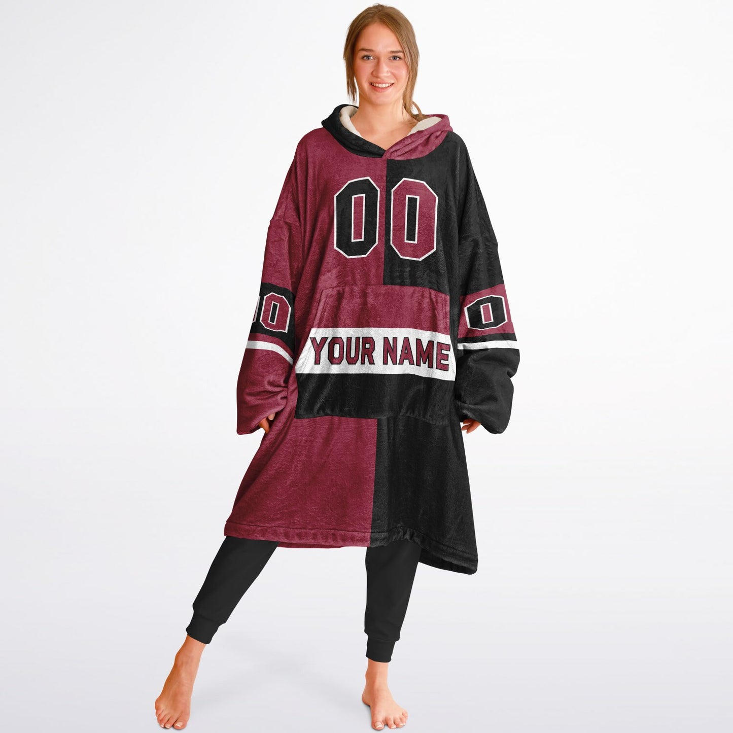 Cardinal red, black, and white halftime snug hoodie with three-tone split design and cozy fleece texture.