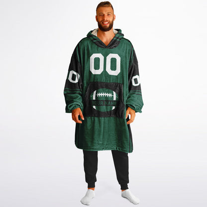 Green and black bold snug hoodie with modern color-block design and soft loungewear fit.