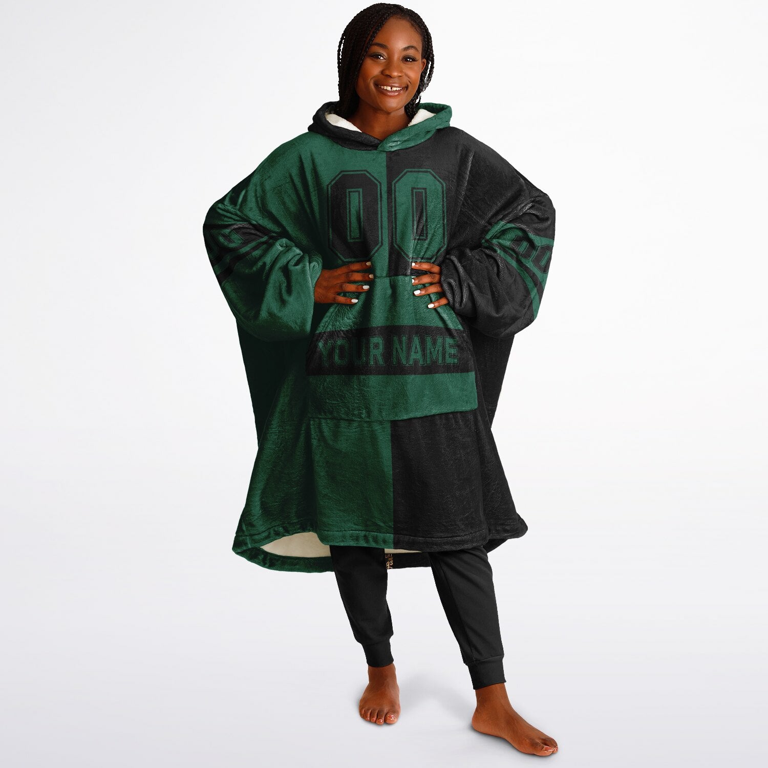 Green and black halftime snug hoodie featuring a symmetrical split design for a dynamic game-day look.