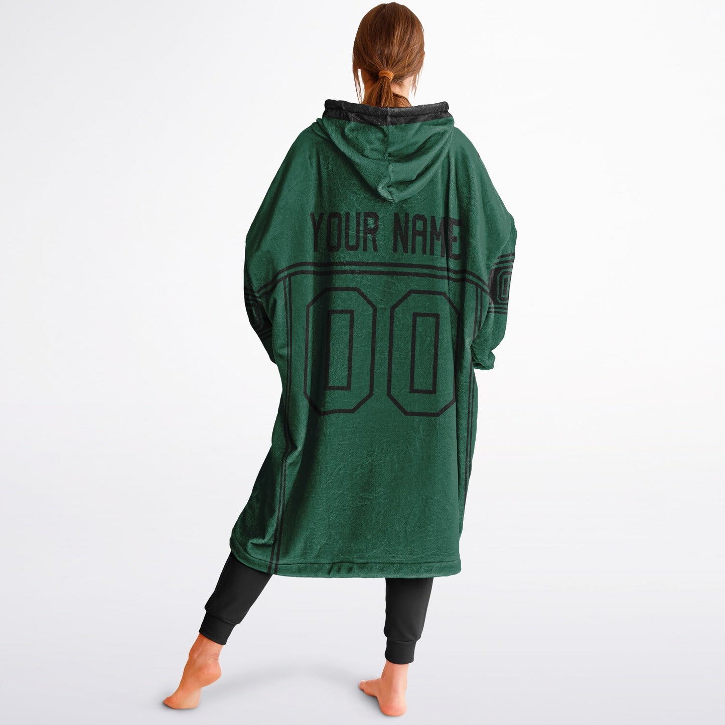Green and black lineup snug hoodie featuring sleek line-art details and minimalist team-inspired design.