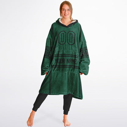 Green and black lineup snug hoodie featuring sleek line-art details and minimalist team-inspired design.