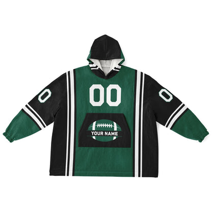 Green, black, and white bold snug hoodie with triple color blocking and a sporty aesthetic.