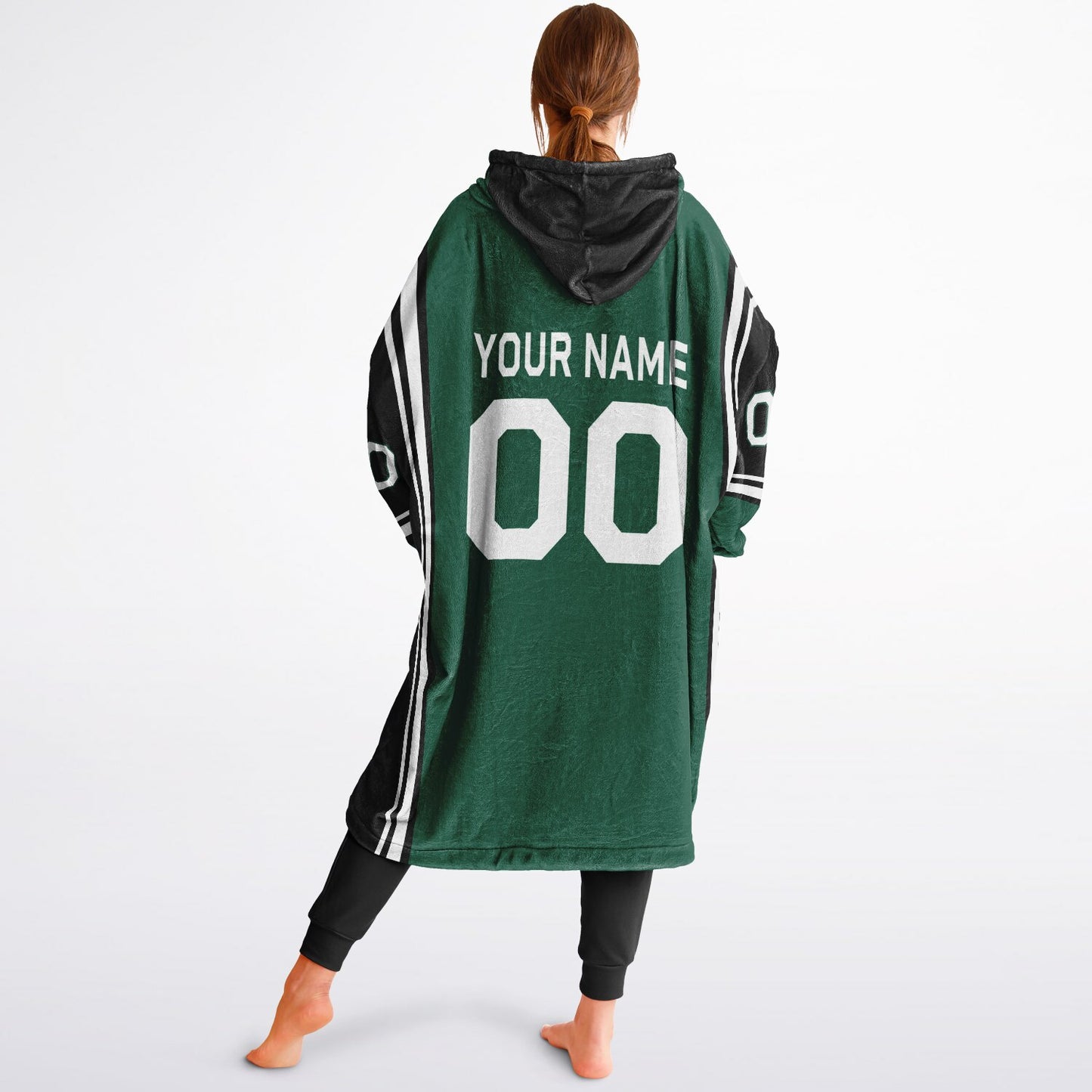Green, black, and white bold snug hoodie with triple color blocking and a sporty aesthetic.