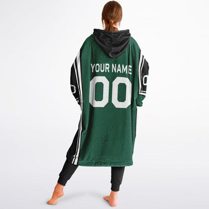 Green, black, and white bold snug hoodie with triple color blocking and a sporty aesthetic.