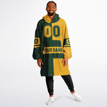 Green and gold halftime snug hoodie featuring a symmetrical split design for a dynamic game-day look.