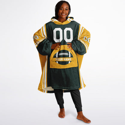 Green, gold, and white bold snug hoodie with triple color blocking and a sporty aesthetic.