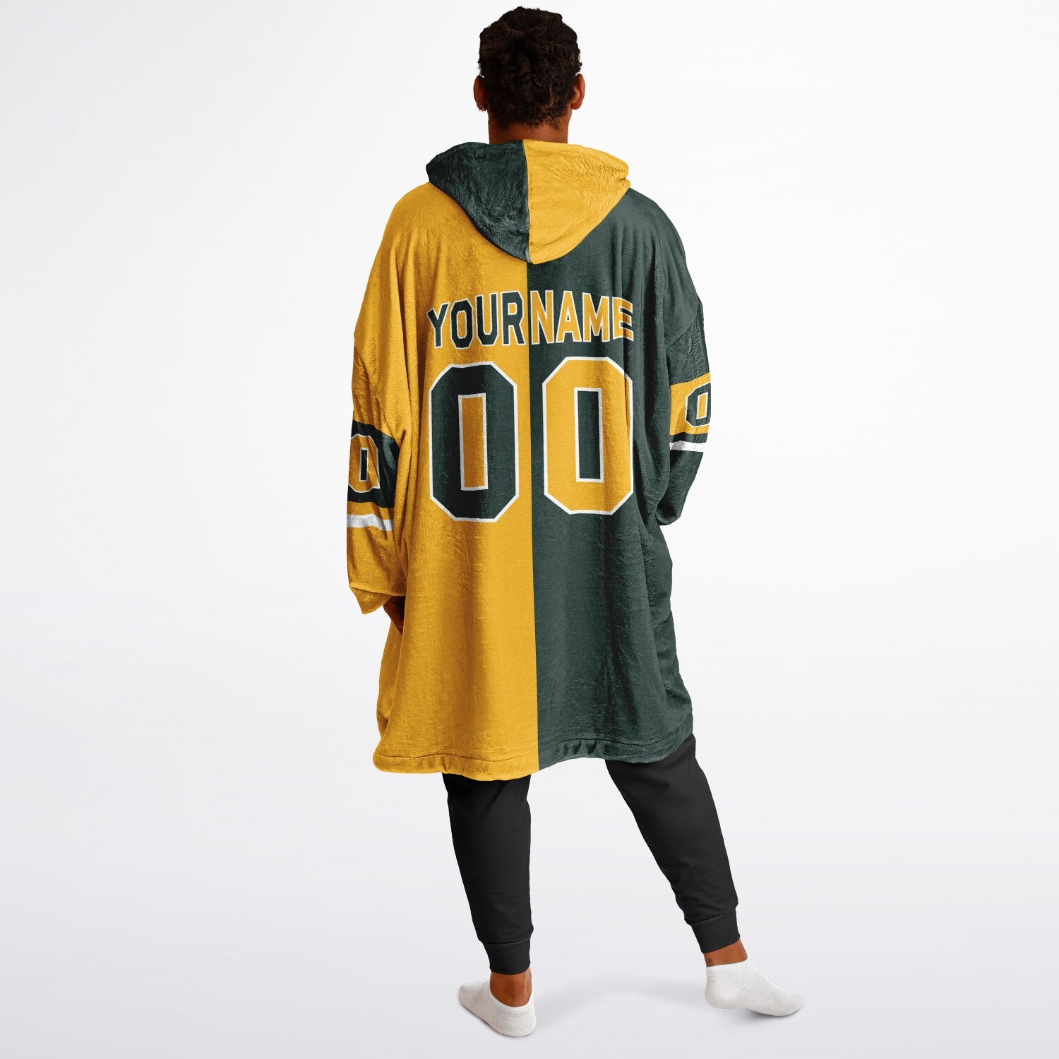 Green, gold, and white halftime snug hoodie with three-tone split design and cozy fleece texture.