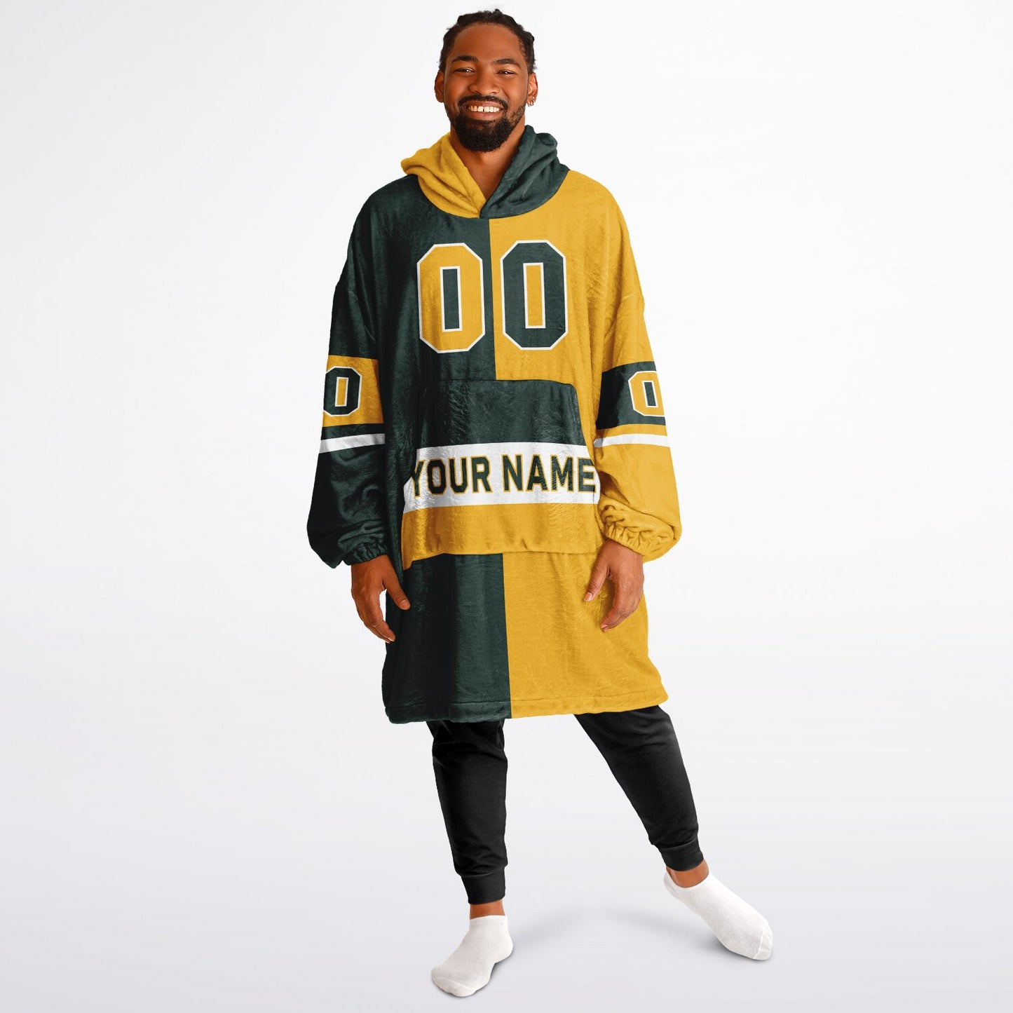 Green, gold, and white halftime snug hoodie with three-tone split design and cozy fleece texture.