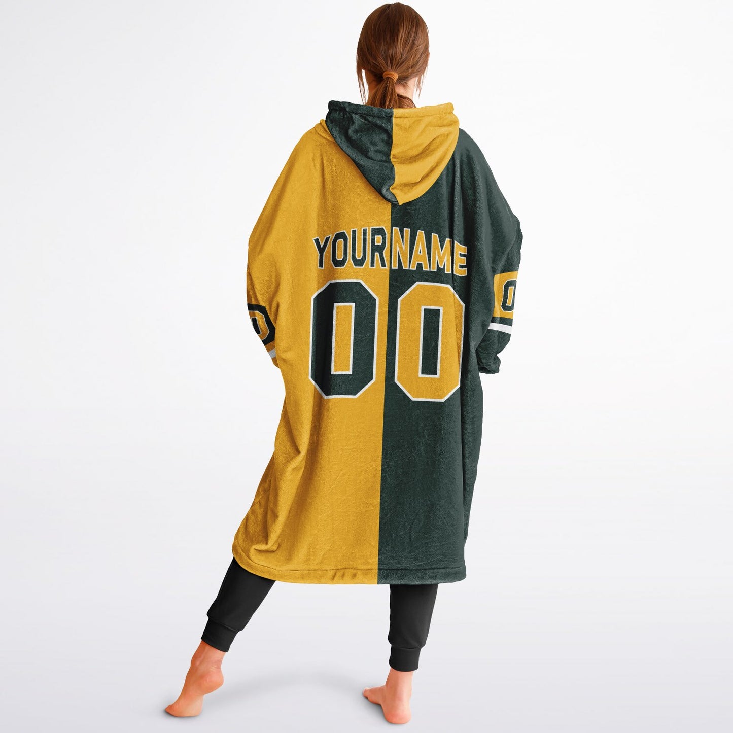 Green, gold, and white halftime snug hoodie with three-tone split design and cozy fleece texture.