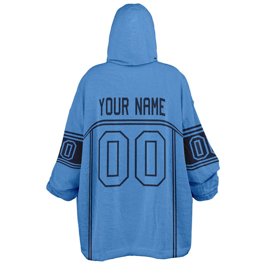 Light blue and navy lineup snug hoodie featuring sleek line-art details and minimalist team-inspired design.
