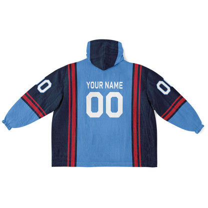 Light blue, navy, and red bold snug hoodie with triple color blocking and a sporty aesthetic.