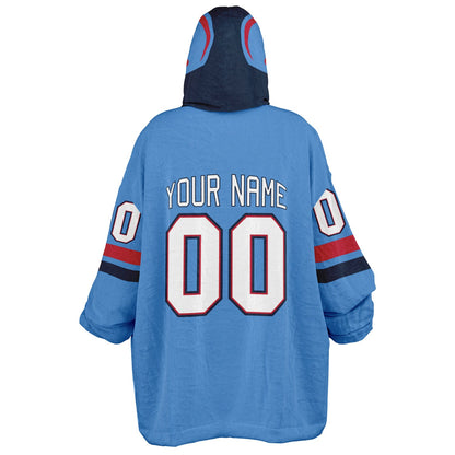 Light blue, navy, and red classic snug hoodie featuring authentic jersey striping and personalized number details.