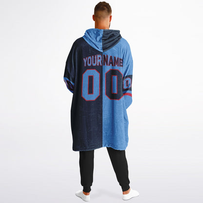 Light blue, navy, and red halftime snug hoodie with three-tone split design and cozy fleece texture.