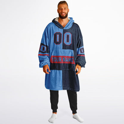 Light blue, navy, and red halftime snug hoodie with three-tone split design and cozy fleece texture.