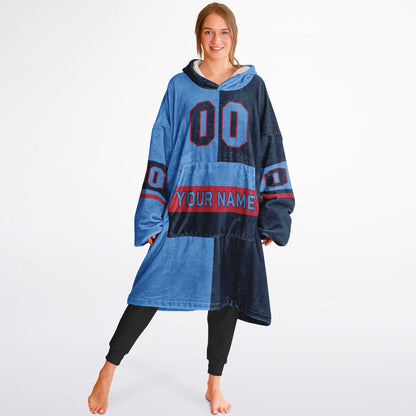 Light blue, navy, and red halftime snug hoodie with three-tone split design and cozy fleece texture.