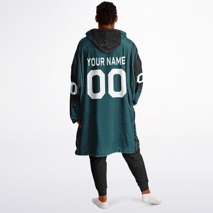 Midnight green and black bold snug hoodie with modern color-block design and soft loungewear fit.
