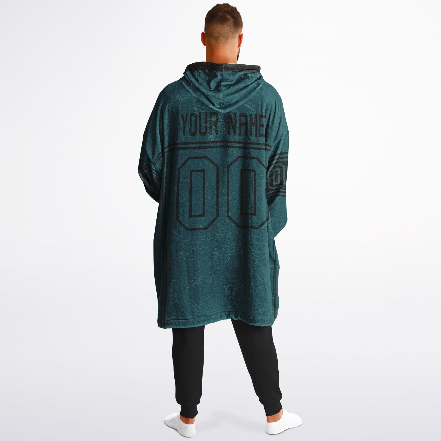 Midnight green and black lineup snug hoodie featuring sleek line-art details and minimalist team-inspired design.