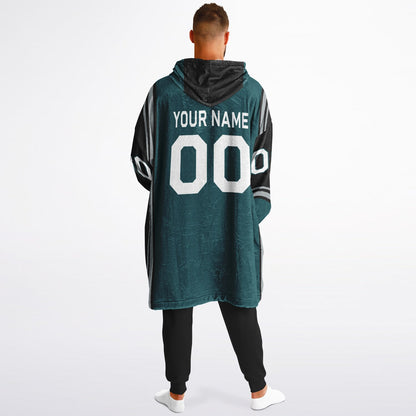 Midnight green, black, and silver bold snug hoodie with triple color blocking and a sporty aesthetic.