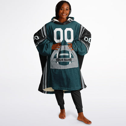 Midnight green, black, and silver bold snug hoodie with triple color blocking and a sporty aesthetic.