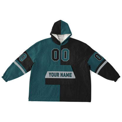 Midnight green, black, and silver halftime snug hoodie with three-tone split design and cozy fleece texture.