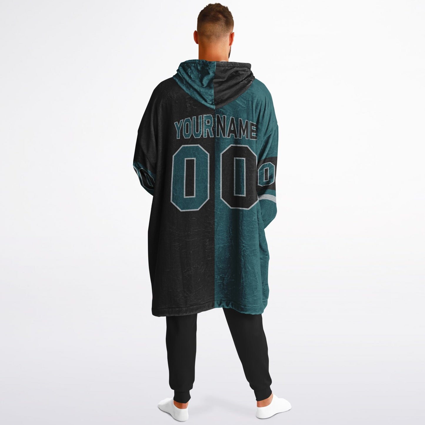 Midnight green, black, and silver halftime snug hoodie with three-tone split design and cozy fleece texture.