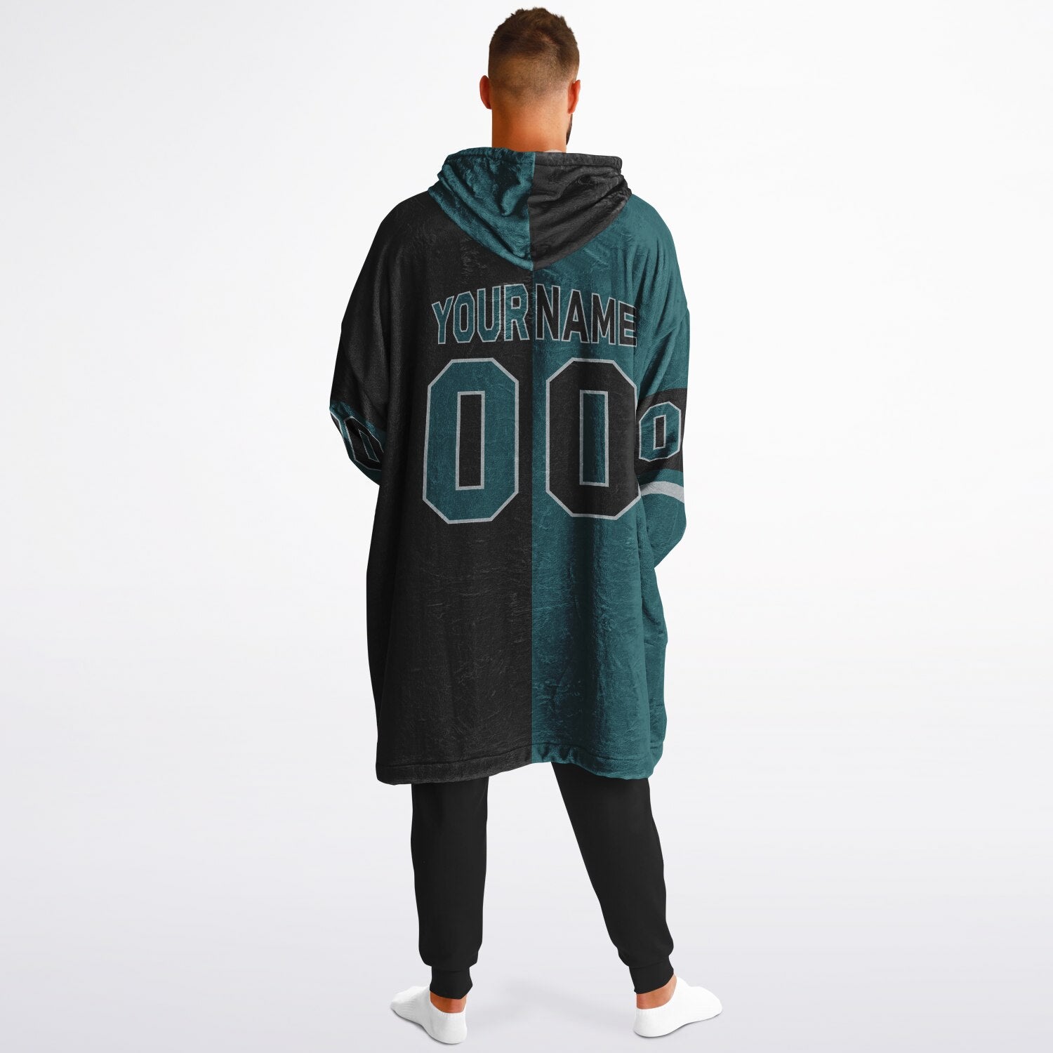 Midnight green, black, and silver halftime snug hoodie with three-tone split design and cozy fleece texture.