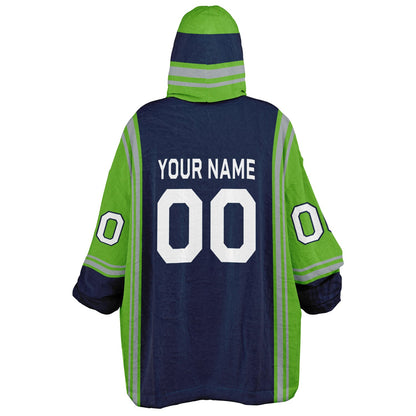 Navy, green, and gray bold snug hoodie with triple color blocking and a sporty aesthetic.