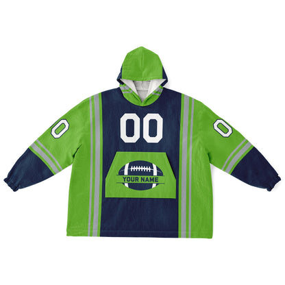 Navy, green, and gray bold snug hoodie with triple color blocking and a sporty aesthetic.