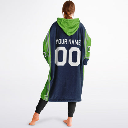Navy, green, and gray bold snug hoodie with triple color blocking and a sporty aesthetic.
