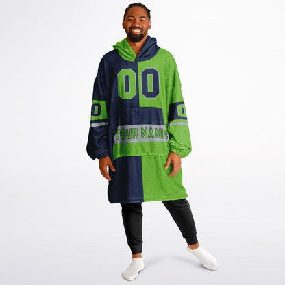 Navy, green, and gray halftime snug hoodie with three-tone split design and cozy fleece texture.