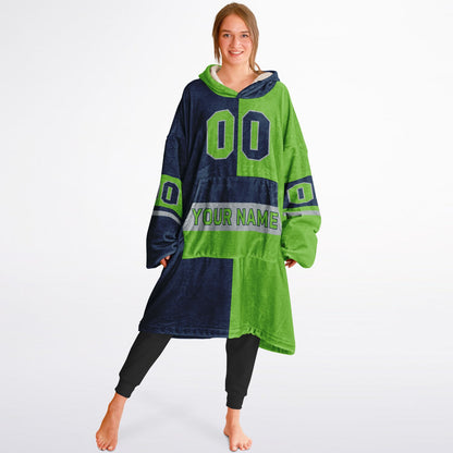 Navy, green, and gray halftime snug hoodie with three-tone split design and cozy fleece texture.
