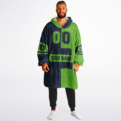 Navy and green halftime snug hoodie featuring a symmetrical split design for a dynamic game-day look.