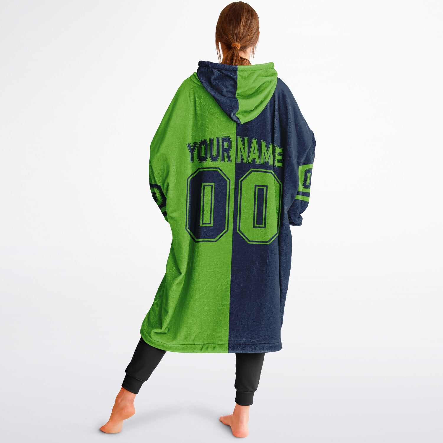 Navy and green halftime snug hoodie featuring a symmetrical split design for a dynamic game-day look.
