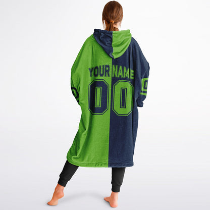 Navy and green halftime snug hoodie featuring a symmetrical split design for a dynamic game-day look.