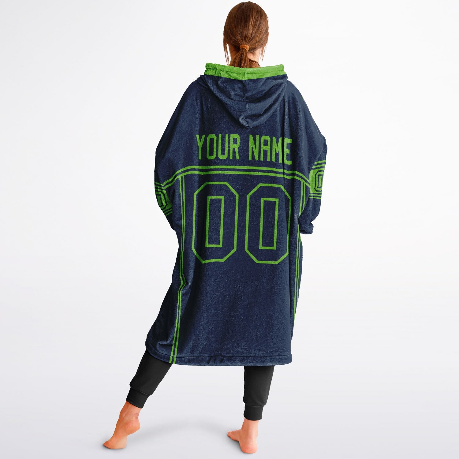 Navy and green lineup snug hoodie featuring sleek line-art details and minimalist team-inspired design.