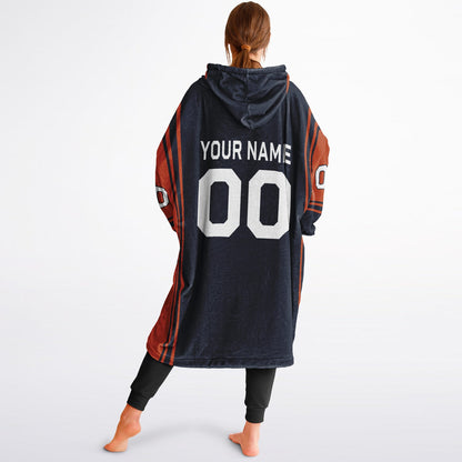 Navy and orange bold snug hoodie with modern color-block design and soft loungewear fit.