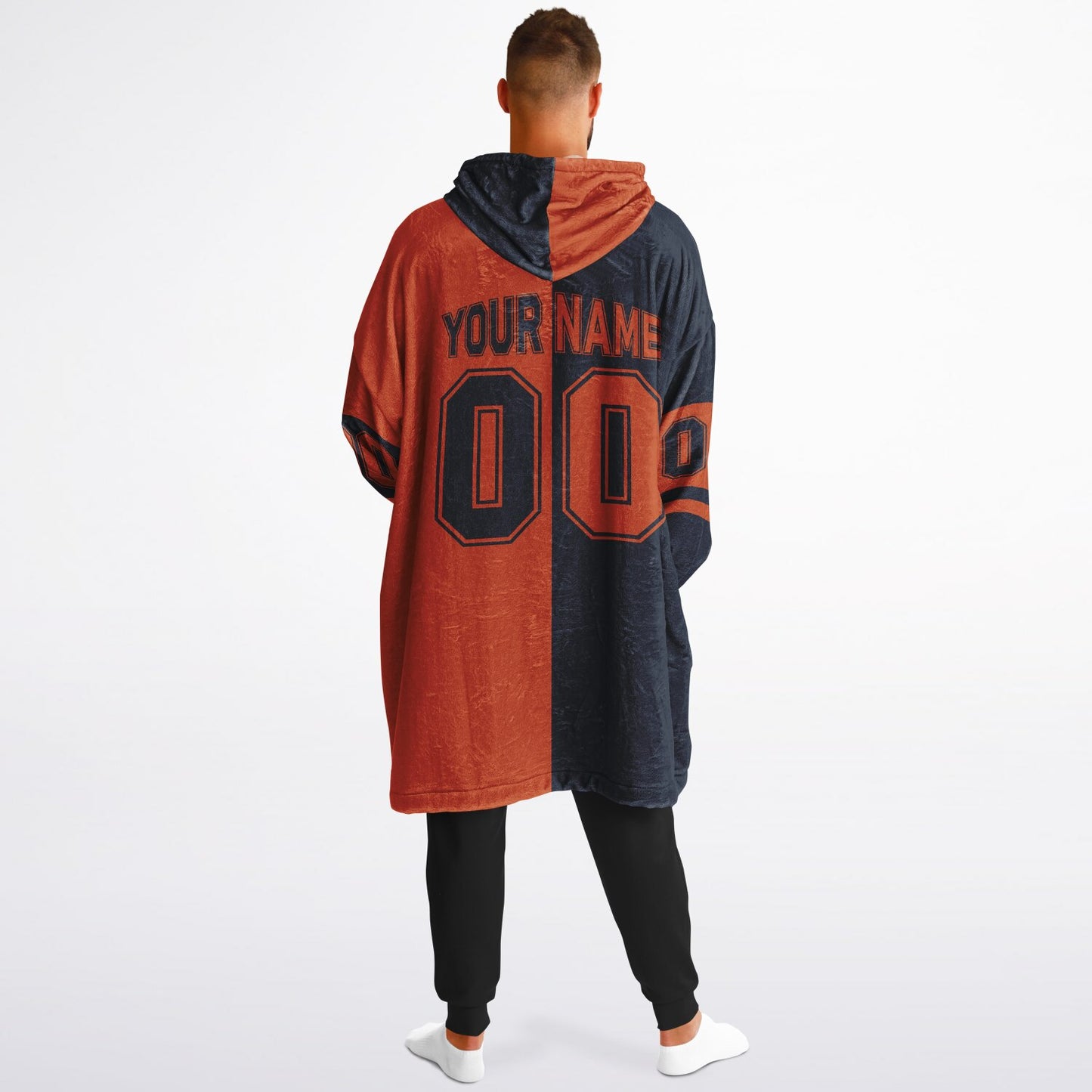 Navy and orange halftime snug hoodie featuring a symmetrical split design for a dynamic game-day look.
