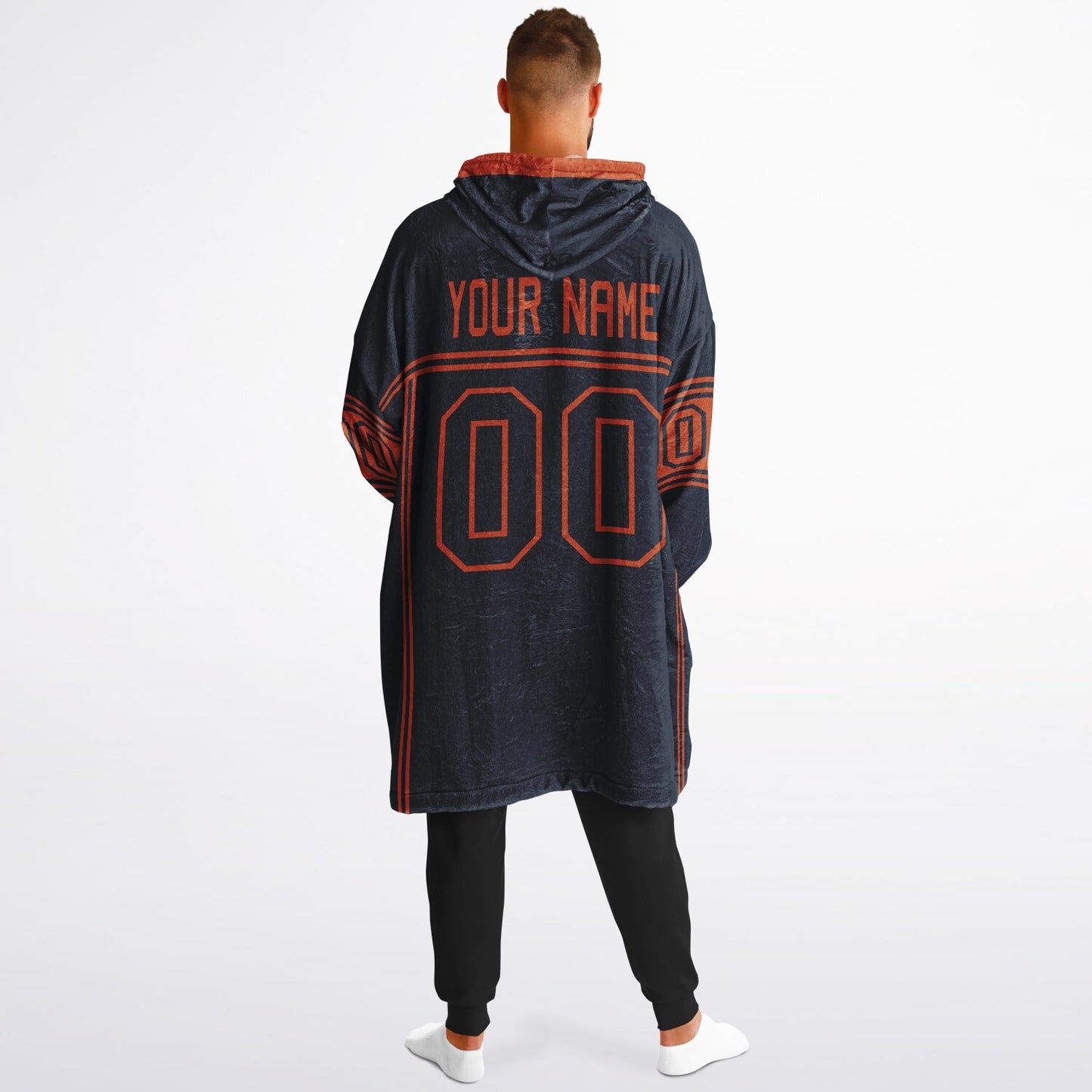 Navy and orange lineup snug hoodie featuring sleek line-art details and minimalist team-inspired design.